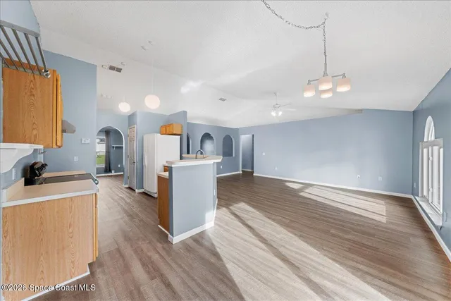 a view of a kitchen and a sink