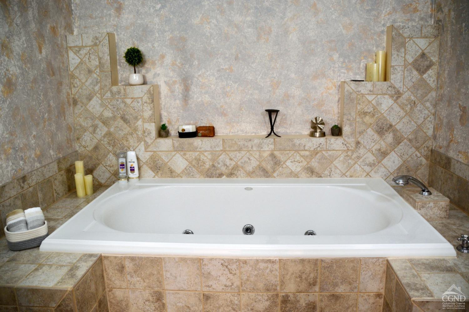 81 Scribner Hollow Road, Unit D 2 Hunter, NY 12442 - Photo 13 of 36 a bath tub sitting in a bathroom