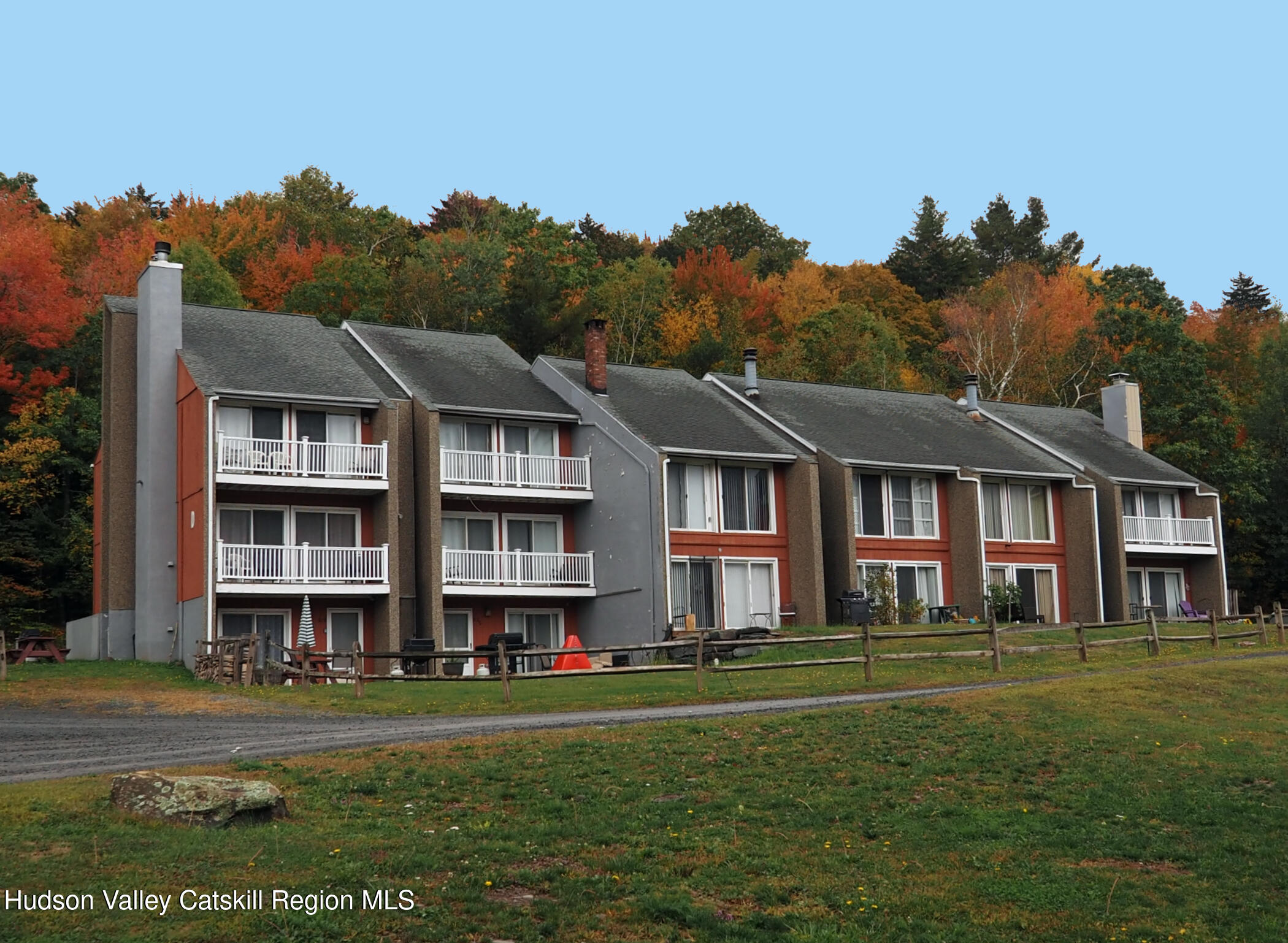 81 Scribner Hollow Road, Unit D 2 Hunter, NY 12442 - Photo 2 of 36 a front view of a house with a garden