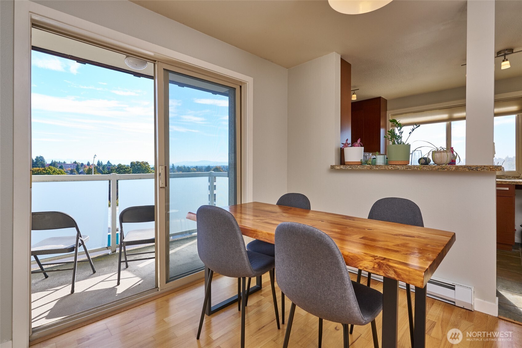 812 North 42nd Street, Unit 301 Seattle, WA 98103 - Photo 24 of 29 a view of a dining room with furniture and window