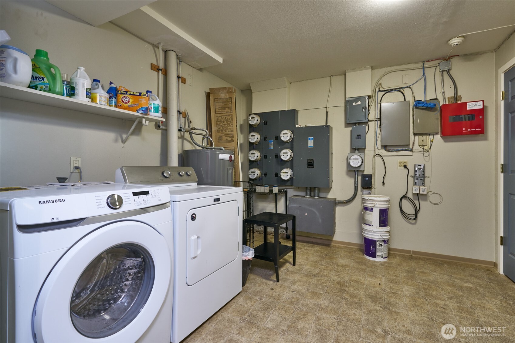 812 North 42nd Street, Unit 301 Seattle, WA 98103 - Photo 26 of 29 a view of storage and utility room with washer and dryer