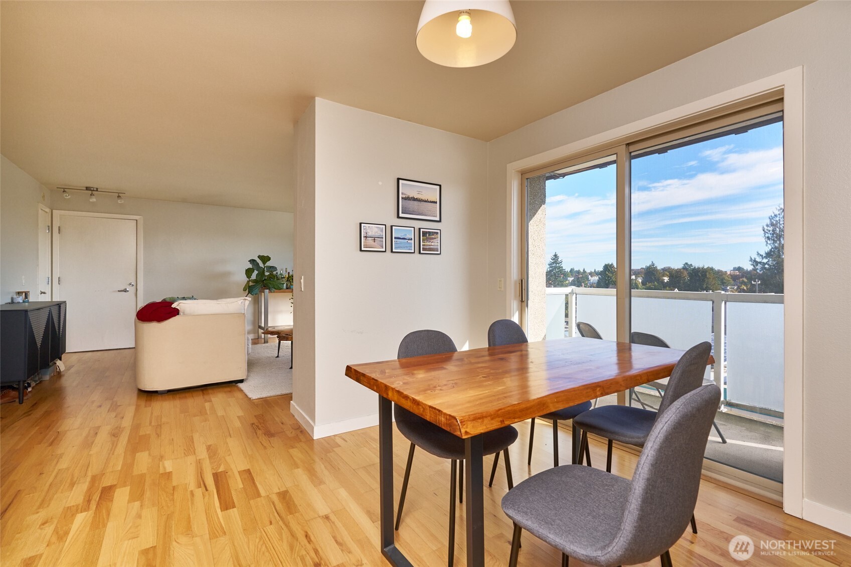 812 North 42nd Street, Unit 301 Seattle, WA 98103 - Photo 9 of 29 a workspace with furniture and wooden floor