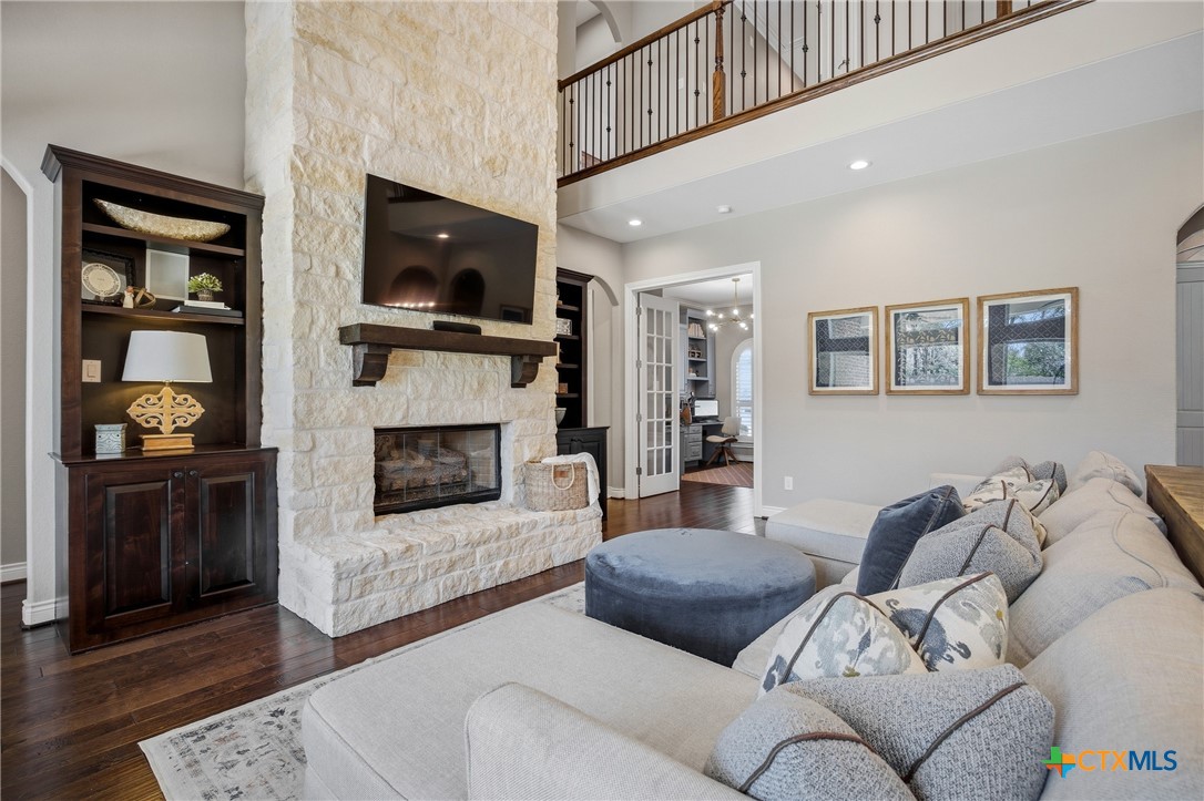 2427 Anderson Point Lane Spring, TX 77388 - Photo 11 of 46 2427 Anderson Point Ln, Spring, TX 77388 - Living room features high ceilings and a sound system that is also connected to back patio
