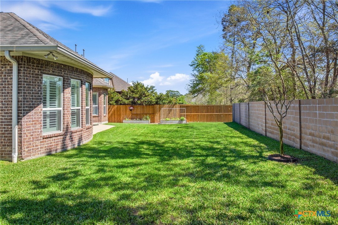2427 Anderson Point Lane Spring, TX 77388 - Photo 40 of 46 2427 Anderson Point Ln, Spring, TX 77388 - Back yard with garden spack