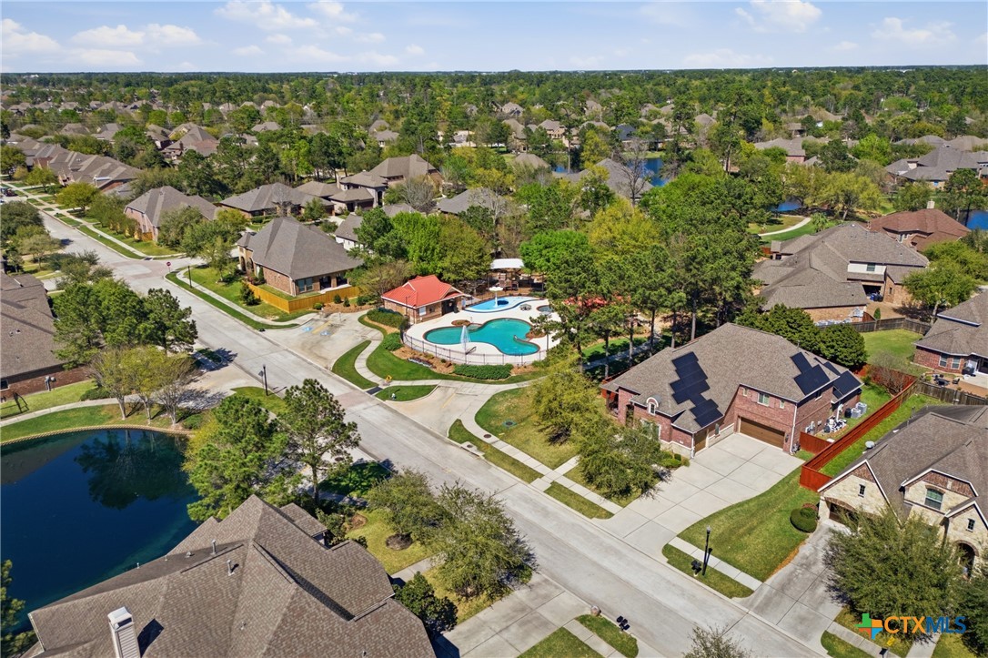 2427 Anderson Point Lane Spring, TX 77388 - Photo 43 of 46 2427 Anderson Point Ln, Spring, TX 77388 - Community pool and splash pad perfect for warm Texas days
