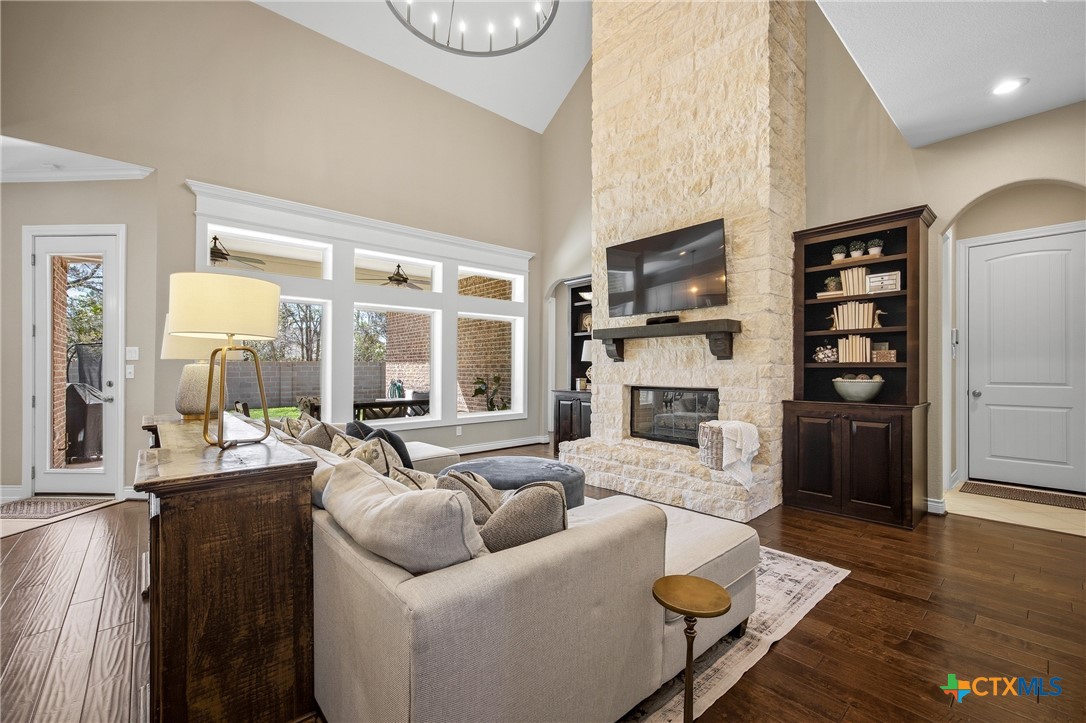 2427 Anderson Point Lane Spring, TX 77388 - Photo 9 of 46 2427 Anderson Point Ln, Spring, TX 77388 - Family room with built-ins and natural light coming from windows overlooking back yard