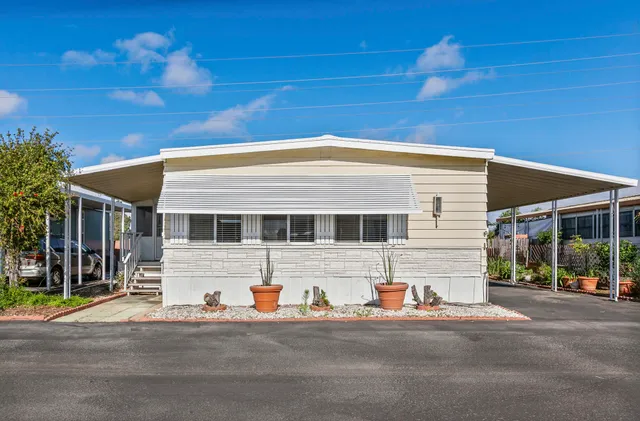 a view of a house with a street