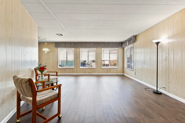 a room with furniture and a large window