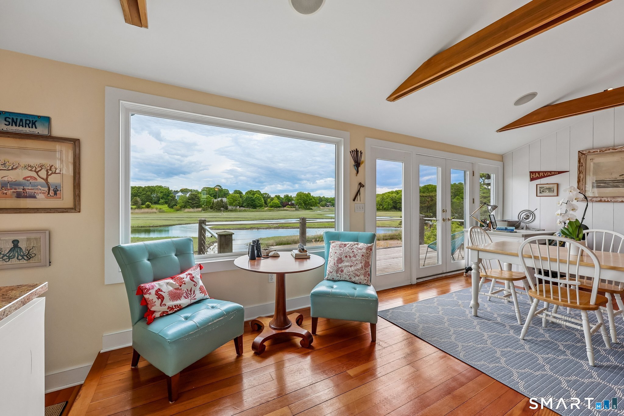 153 Middle Beach Road Madison, CT 06443 - Photo 26 of 40 As soon as you walk into the guest house apartment, you will be amazed by the beauty of the space with a wall of windows overlooking the marsh and wildlife