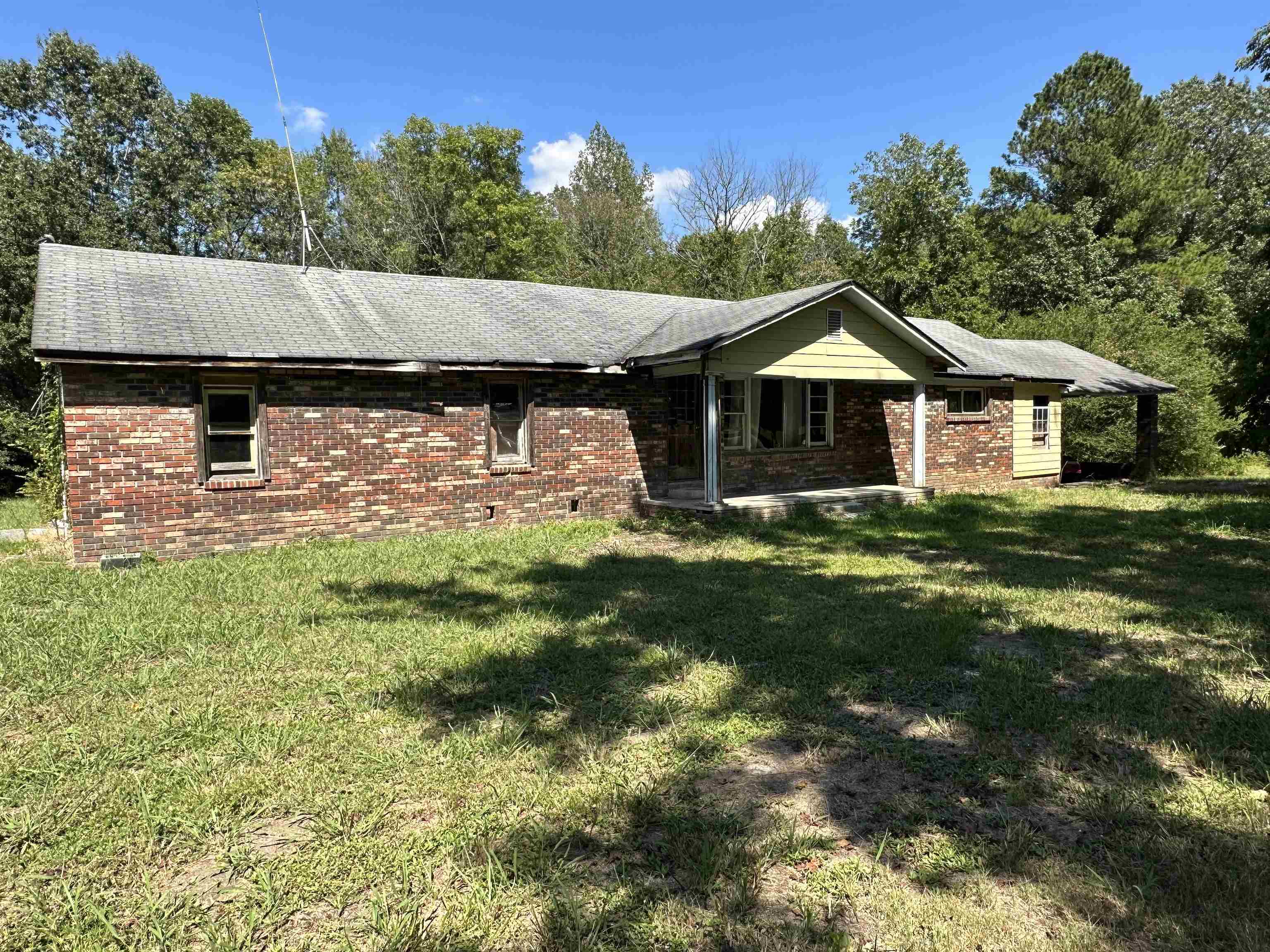 22 Deason Road Armuchee, GA 30105 - Photo 1 of 1 a front view of a house with garden