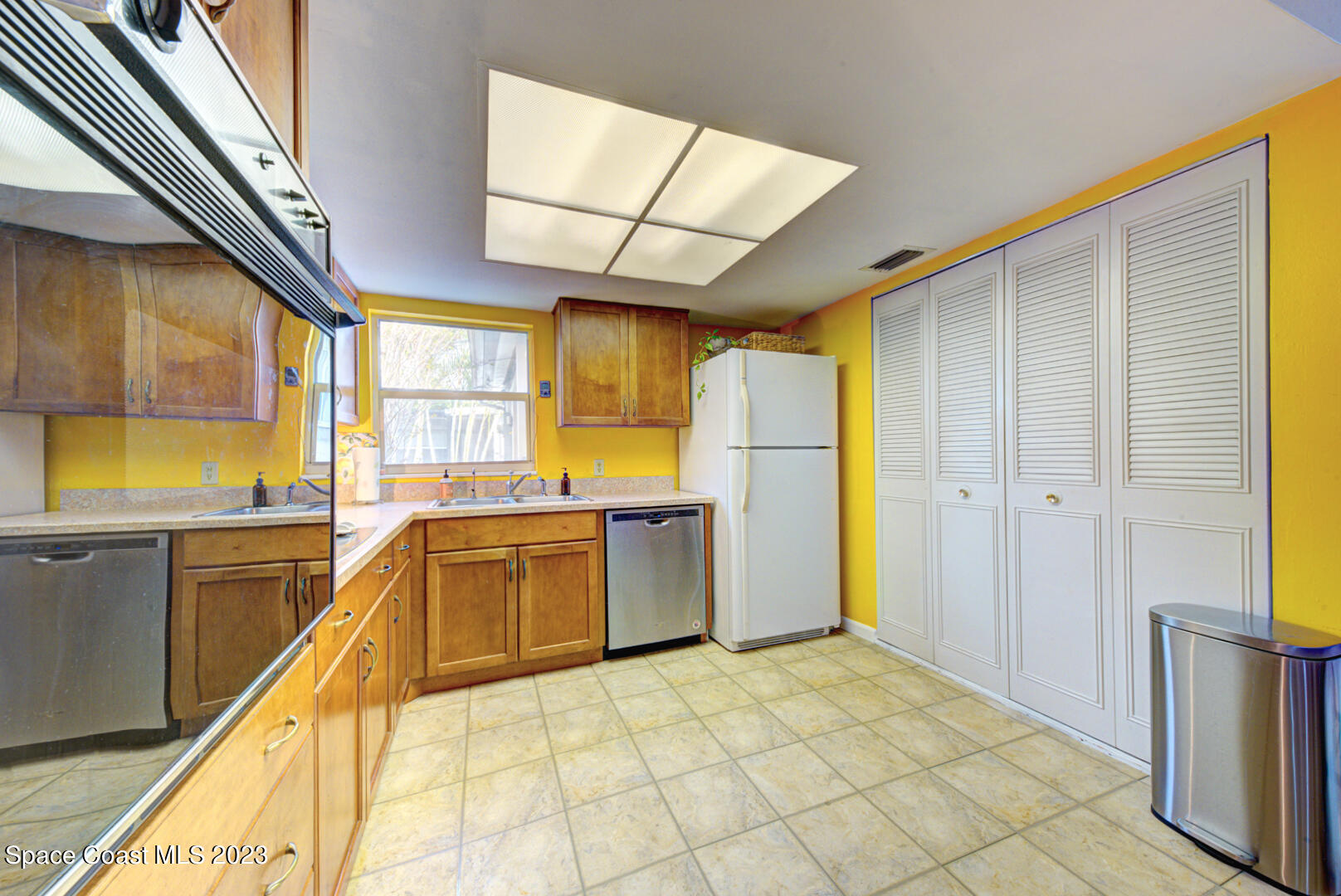2180 Cindy Circle Melbourne, FL 32935 - Photo 11 of 31 a kitchen with a sink appliances and cabinets