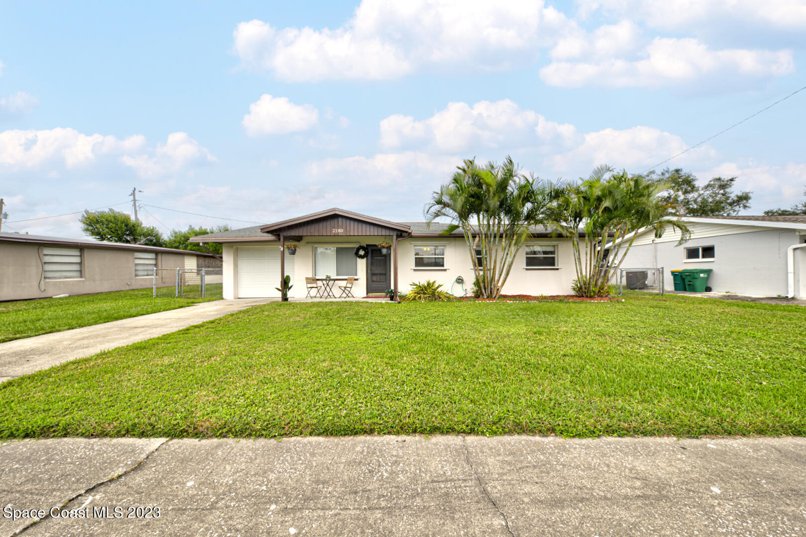 2180 Cindy Circle Melbourne, FL 32935 - Photo 30 of 31 a front view of house with yard and green space
