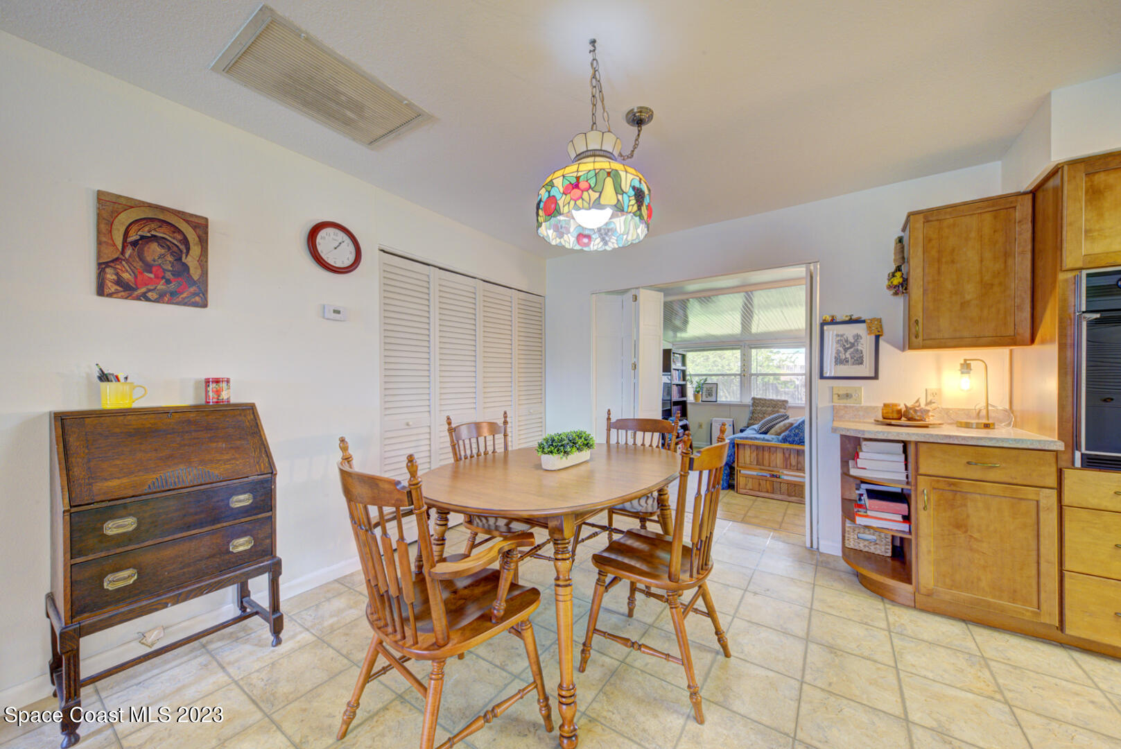2180 Cindy Circle Melbourne, FL 32935 - Photo 8 of 31 a view of a dining room with furniture