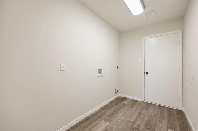 a view of small space with wooden floor