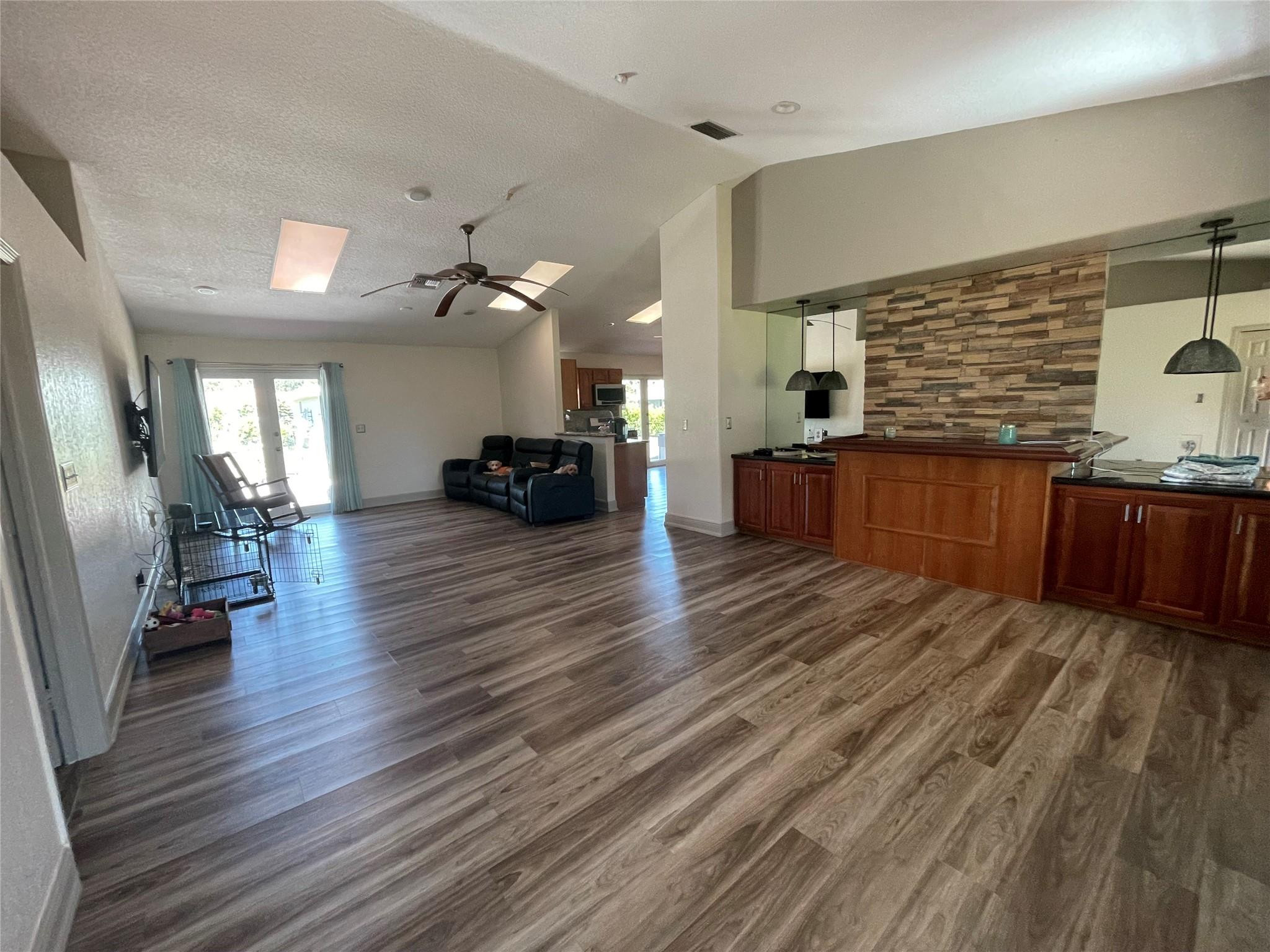 17001 Southwest 48th Street Southwest Ranches, FL 33331 - Photo 19 of 35 a living room with furniture and wooden floor