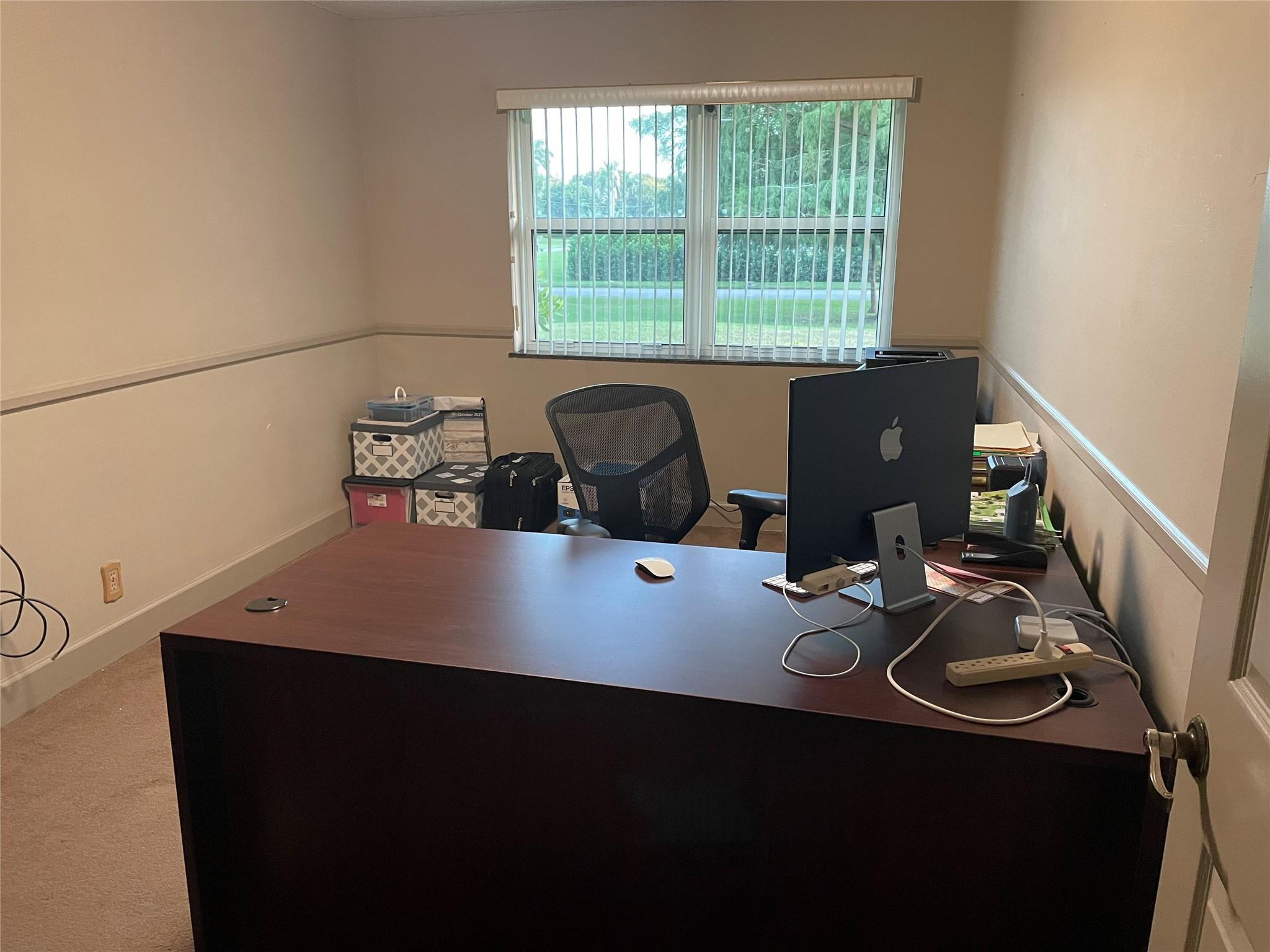 17001 Southwest 48th Street Southwest Ranches, FL 33331 - Photo 33 of 35 a view of a workspace with furniture