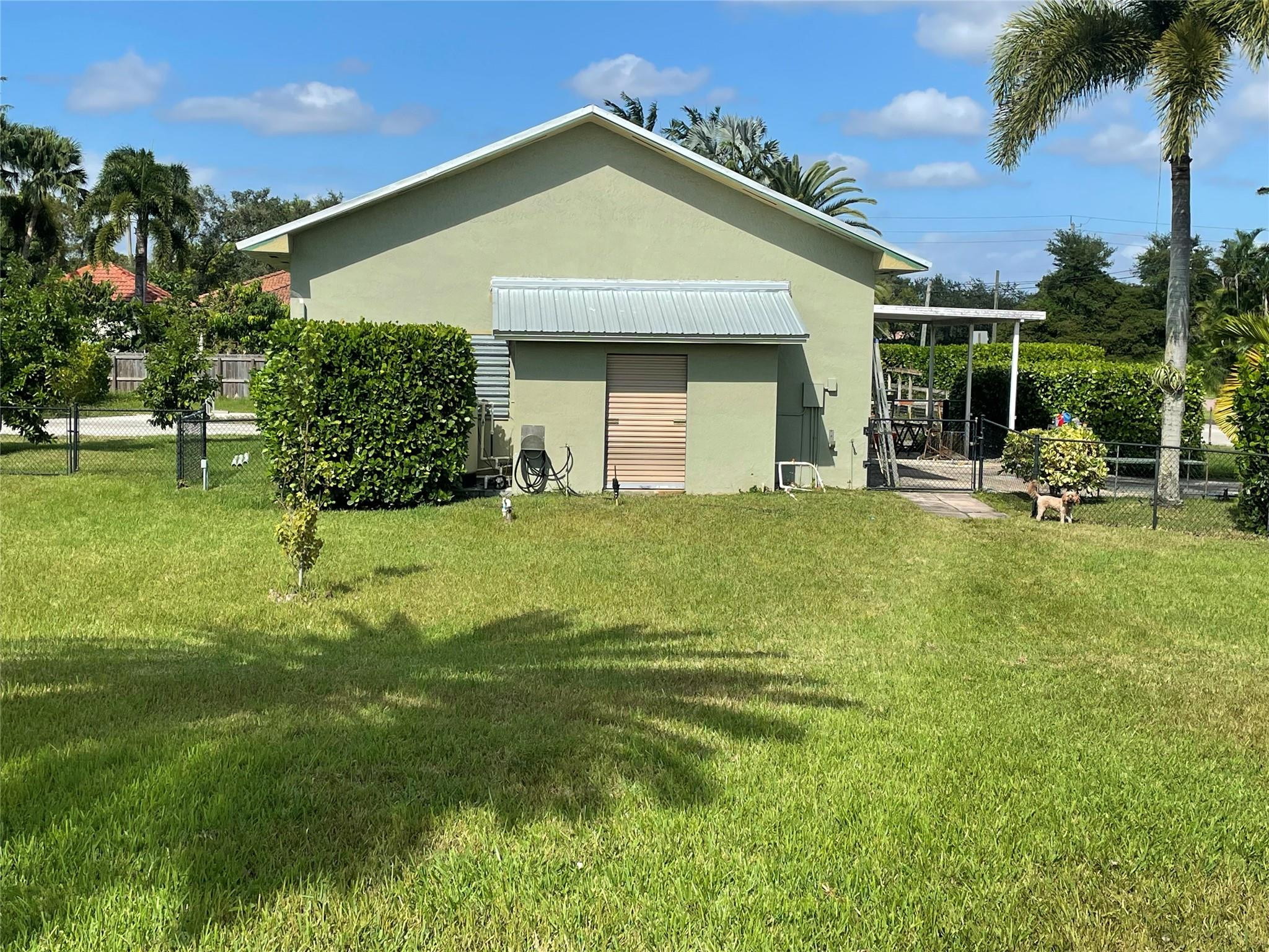 17001 Southwest 48th Street Southwest Ranches, FL 33331 - Photo 10 of 35 a view of a house with a yard and sitting area