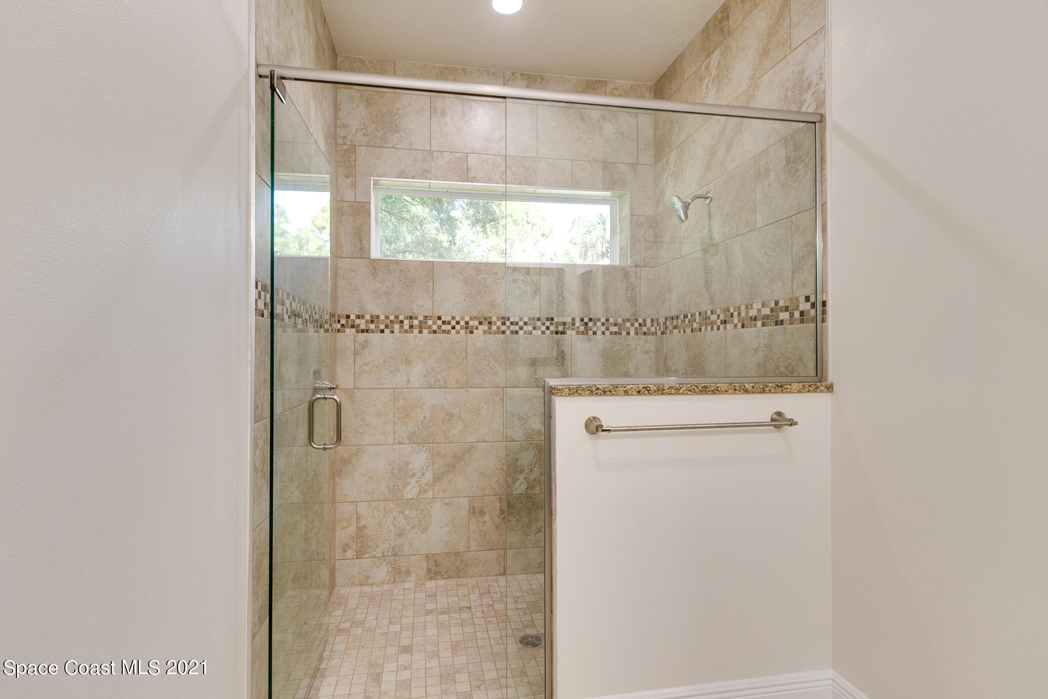 487 Abello Road Southeast, Unit 50 Palm Bay, FL 32909 - Photo 20 of 23 a bathroom with a shower