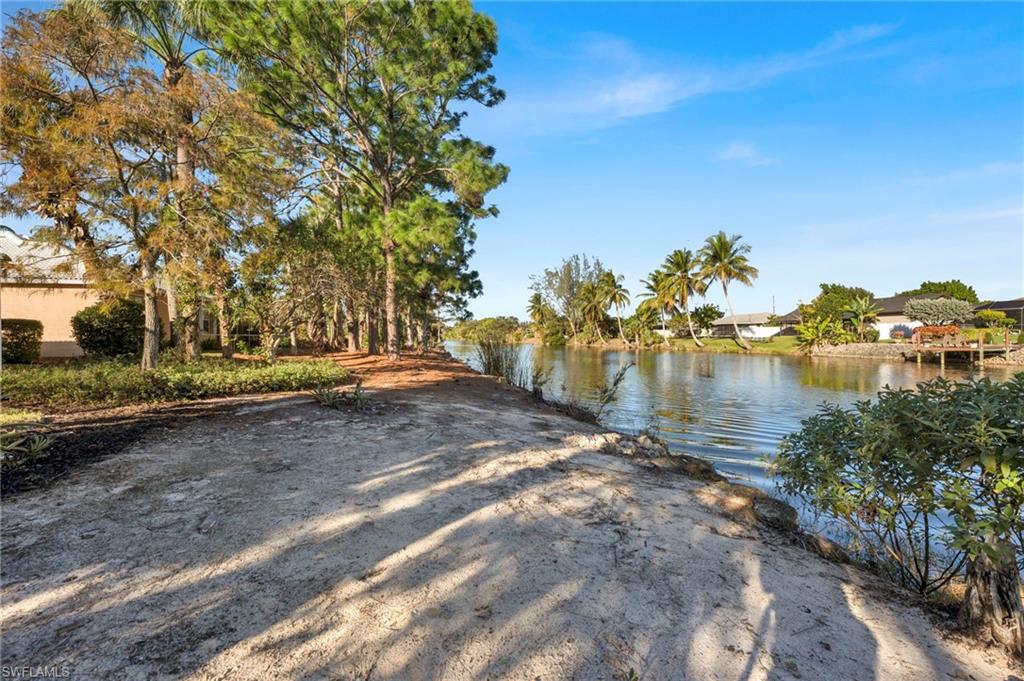 3685 Yosemite Court Naples, FL 34116 - Photo 2 of 16 Rear view of canal with access to the Gulf