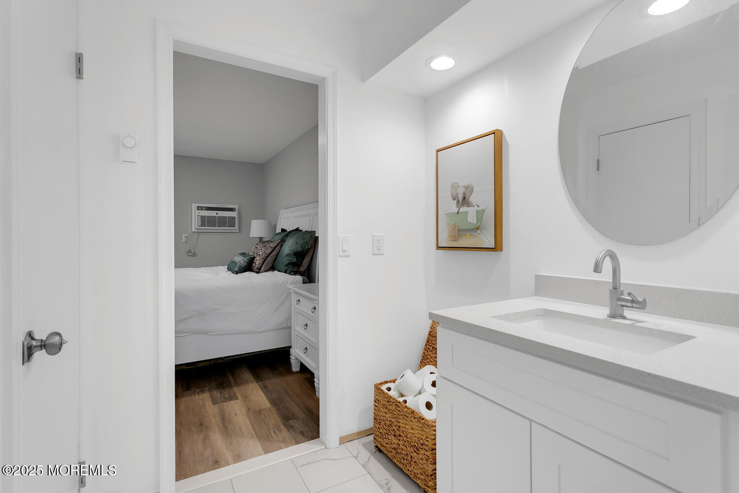 31 Hancock Court Red Bank, NJ 07701 - Photo 14 of 32 a en suite bathroom with a double vanity sink and a mirror