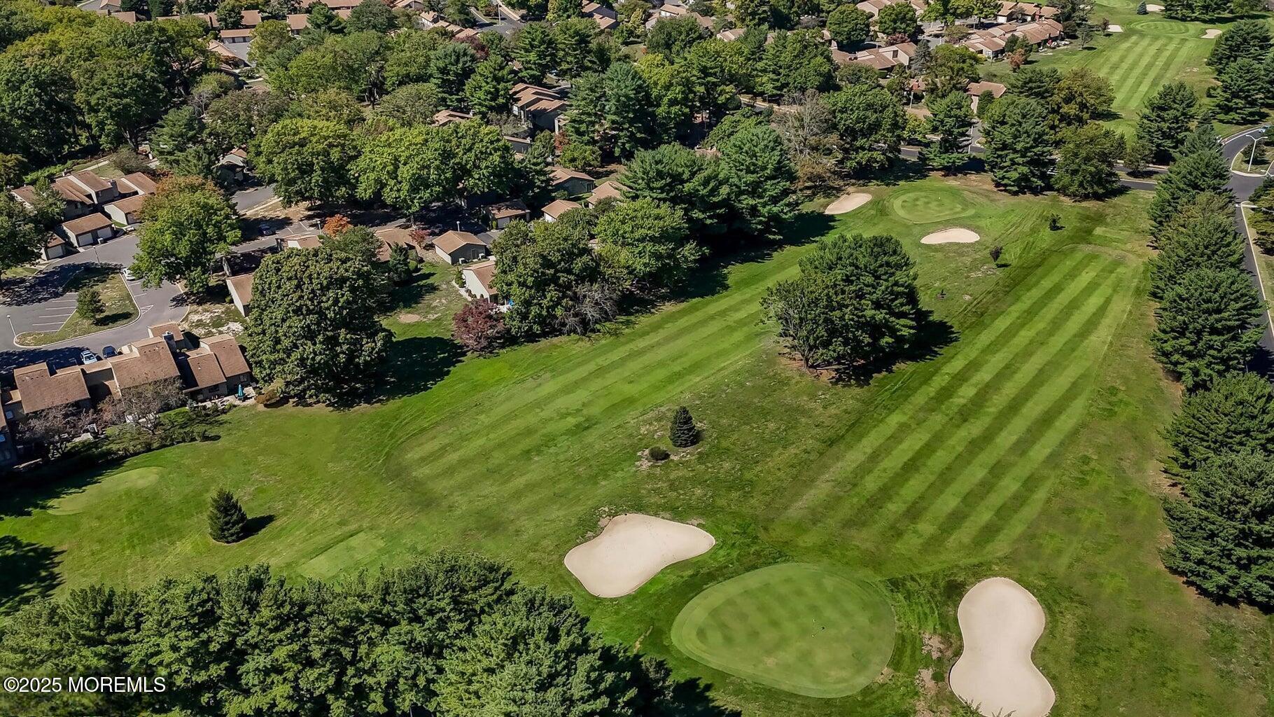 31 Hancock Court Red Bank, NJ 07701 - Photo 24 of 32 a backyard of a house with a yard and outdoor seating