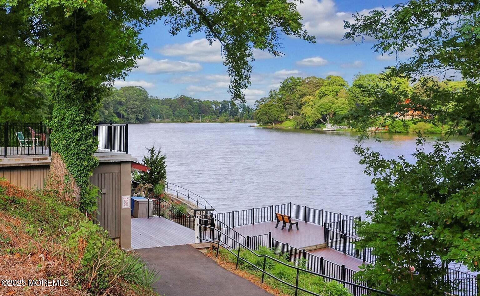 31 Hancock Court Red Bank, NJ 07701 - Photo 27 of 32 an aerial view of a house with a yard and lake view