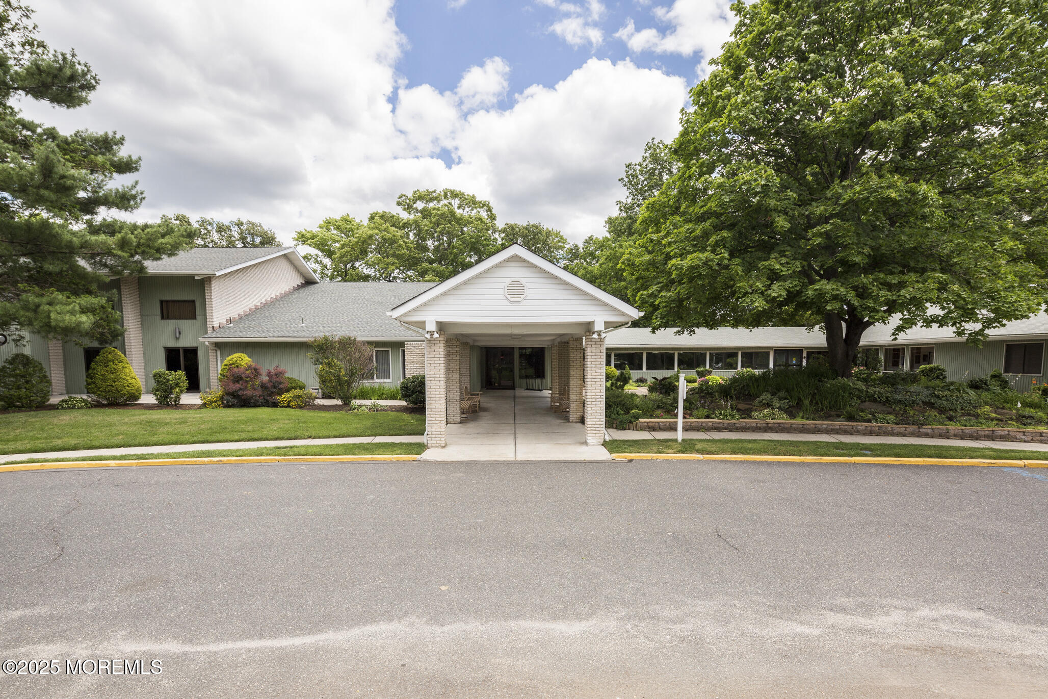 31 Hancock Court Red Bank, NJ 07701 - Photo 29 of 32 a front view of a house with a yard and large trees