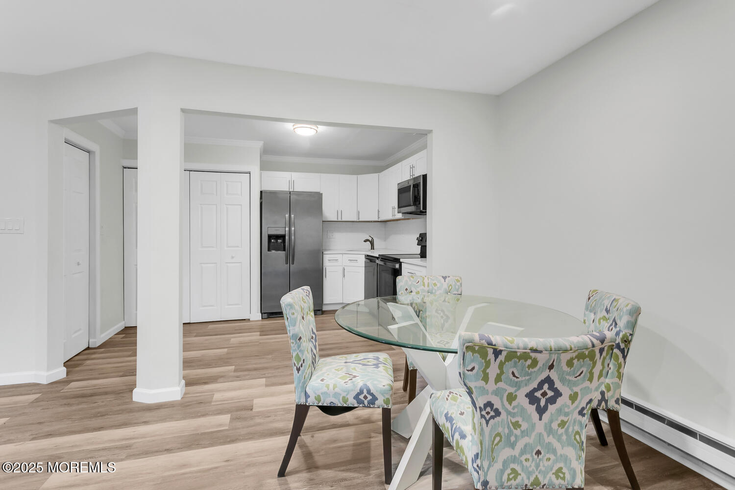 31 Hancock Court Red Bank, NJ 07701 - Photo 3 of 32 a view of a dining room with furniture and wooden floor
