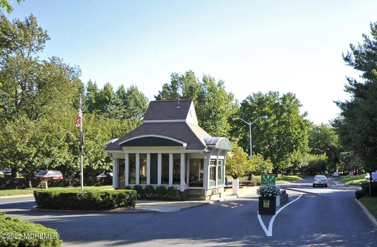 31 Hancock Court Red Bank, NJ 07701 - Photo 31 of 32 a front view of a house with a yard