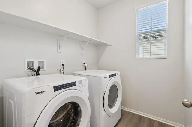 a utility room with dryer and washer