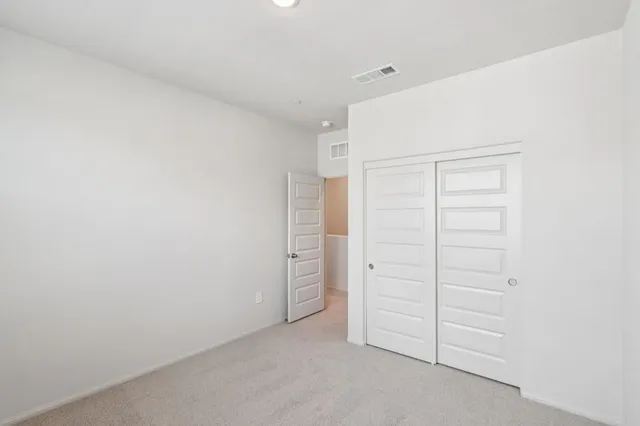 an empty room with closet
