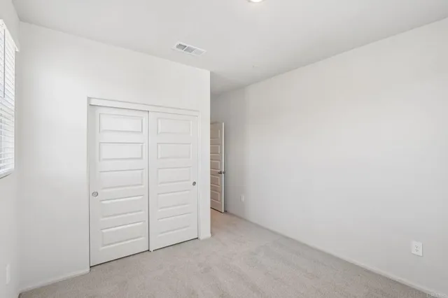 an empty room with closet