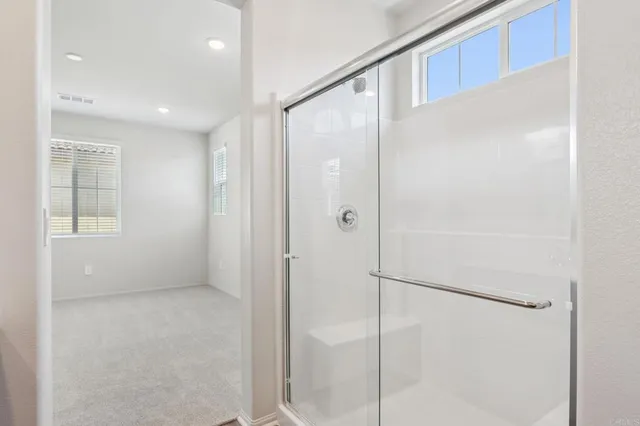 a view of an empty walk in closet