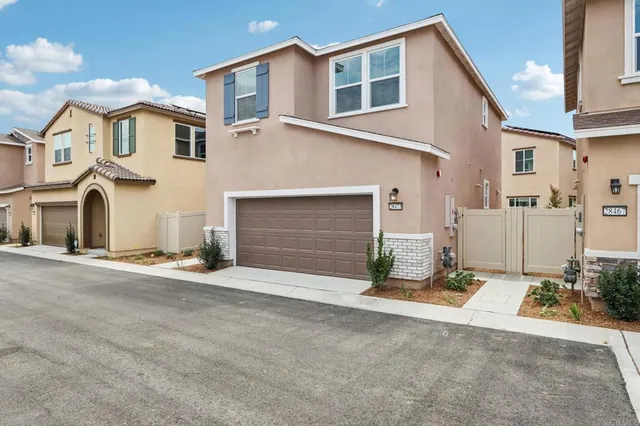 front view of a house with a street
