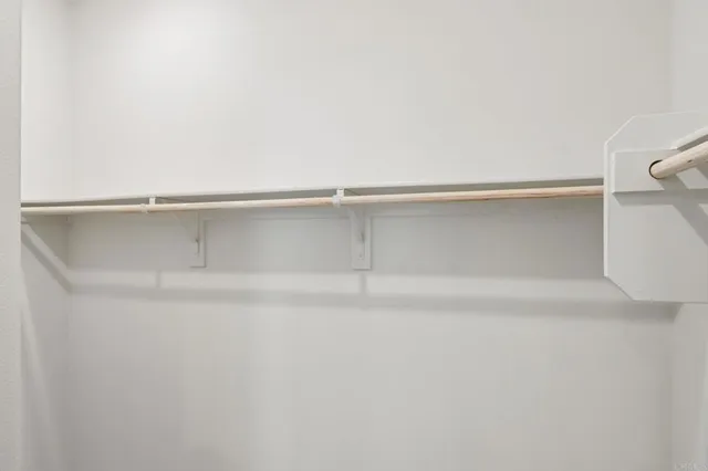 a view of a house with backyard and garden