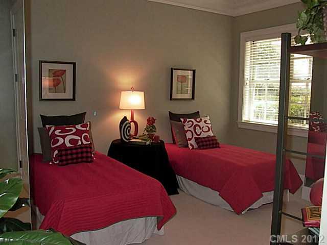 2823 Providence Road, Unit 312 Charlotte, NC 28211 - Photo 13 of 16 a bedroom with two beds and a window