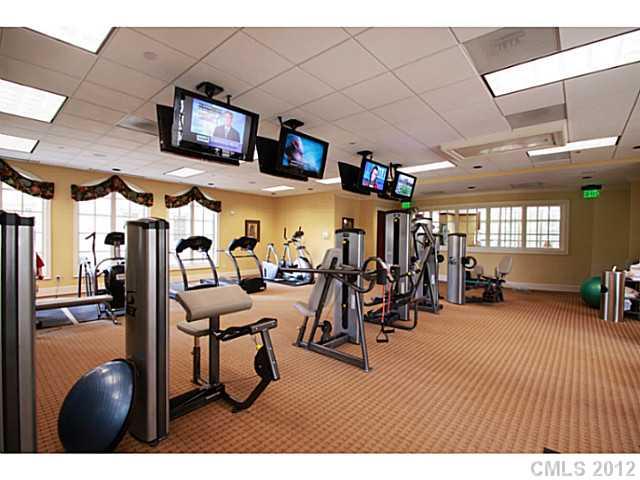 2823 Providence Road, Unit 312 Charlotte, NC 28211 - Photo 4 of 16 a view of a room with gym equipment