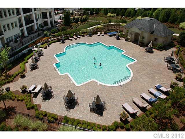 2823 Providence Road, Unit 312 Charlotte, NC 28211 - Photo 5 of 16 an aerial view of a residential houses with outdoor space and street view