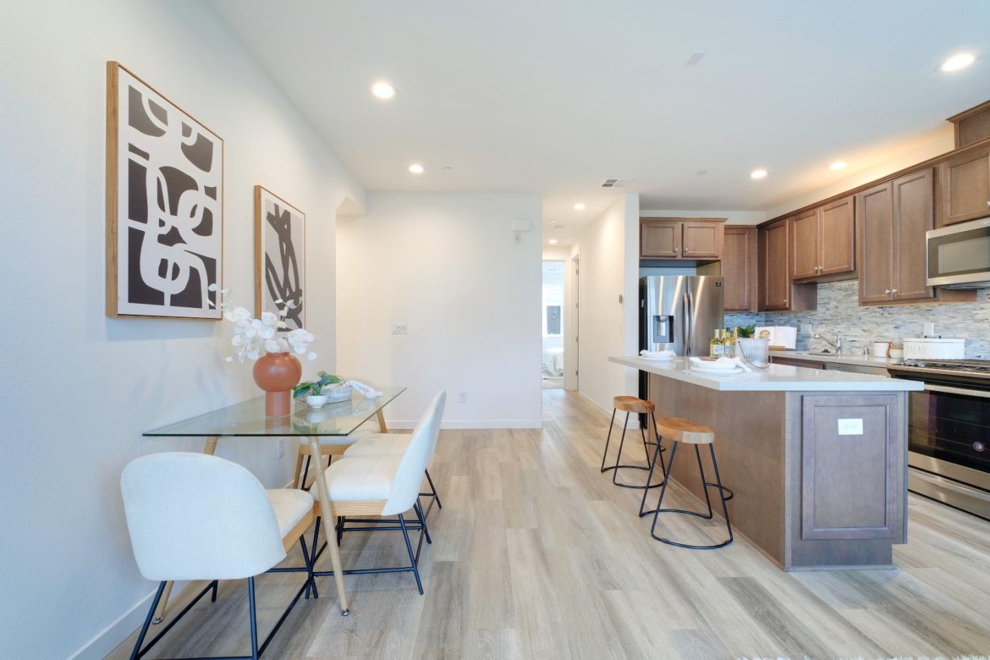 1888 Joshua Tree Circle Milpitas, CA 95035 - Photo 11 of 50 a kitchen with a table and chairs in it