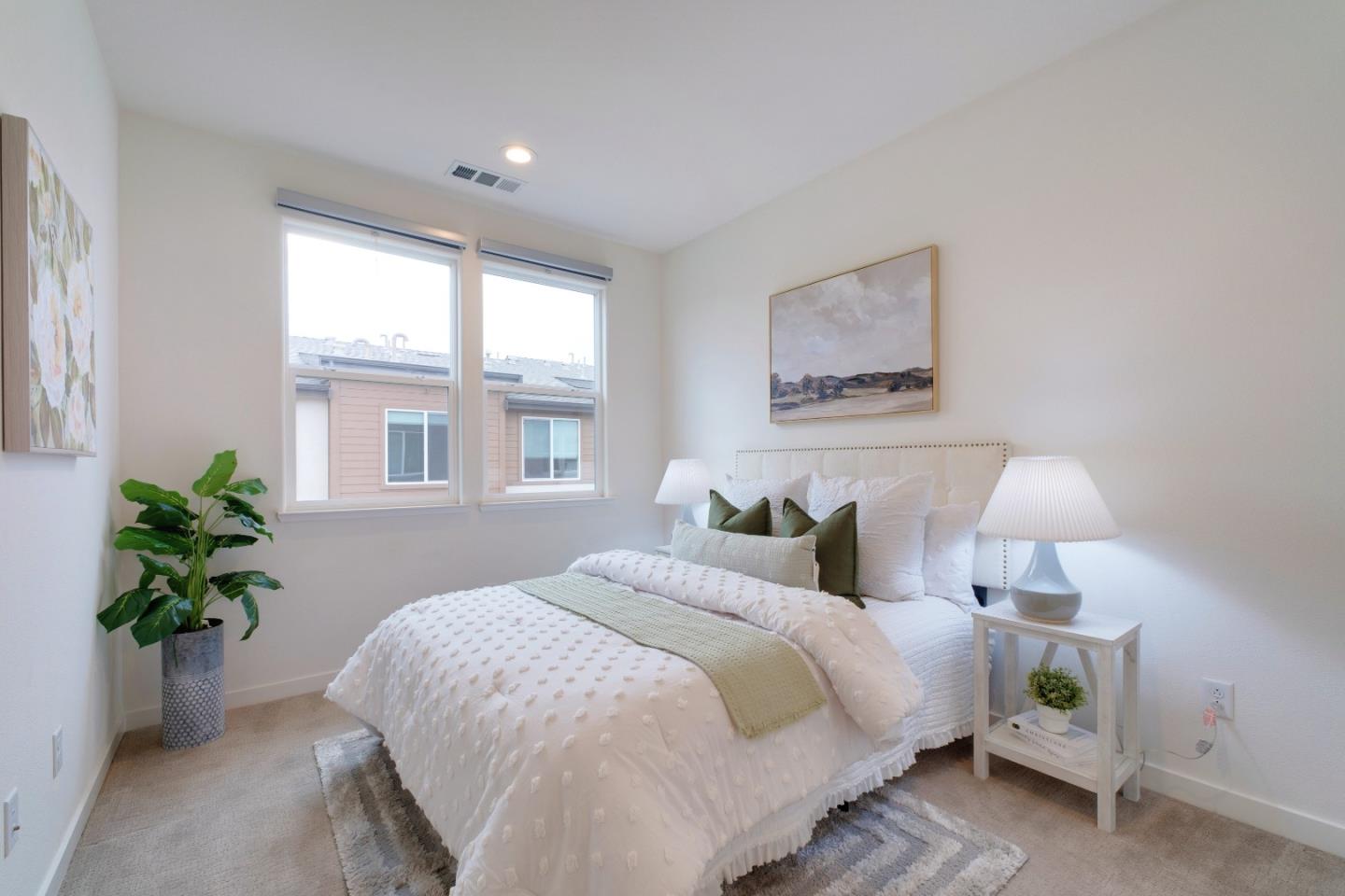 1888 Joshua Tree Circle Milpitas, CA 95035 - Photo 32 of 50 a bedroom with bed and a window