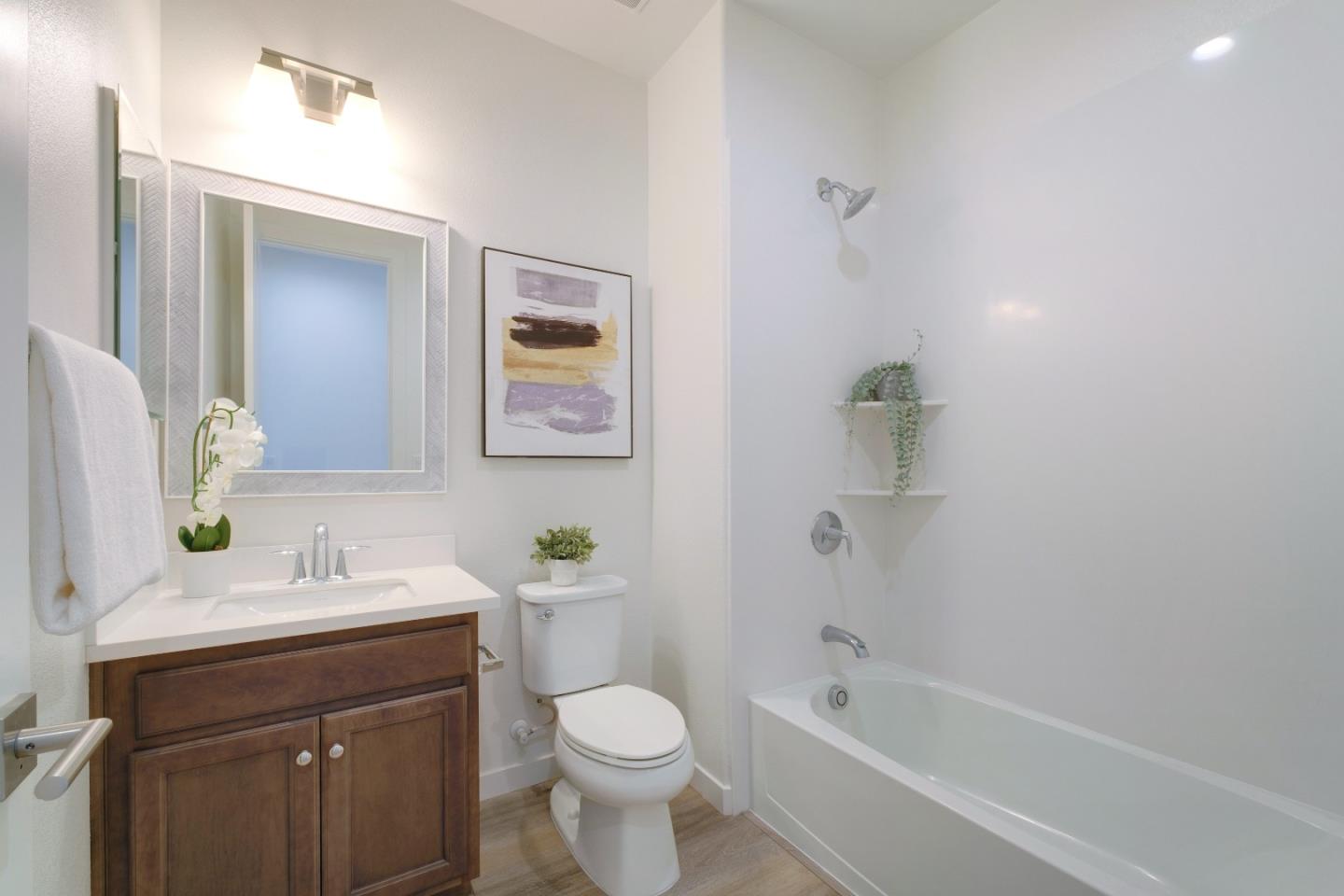 1888 Joshua Tree Circle Milpitas, CA 95035 - Photo 35 of 50 a bathroom with a bathtub shower sink vanity and toilet