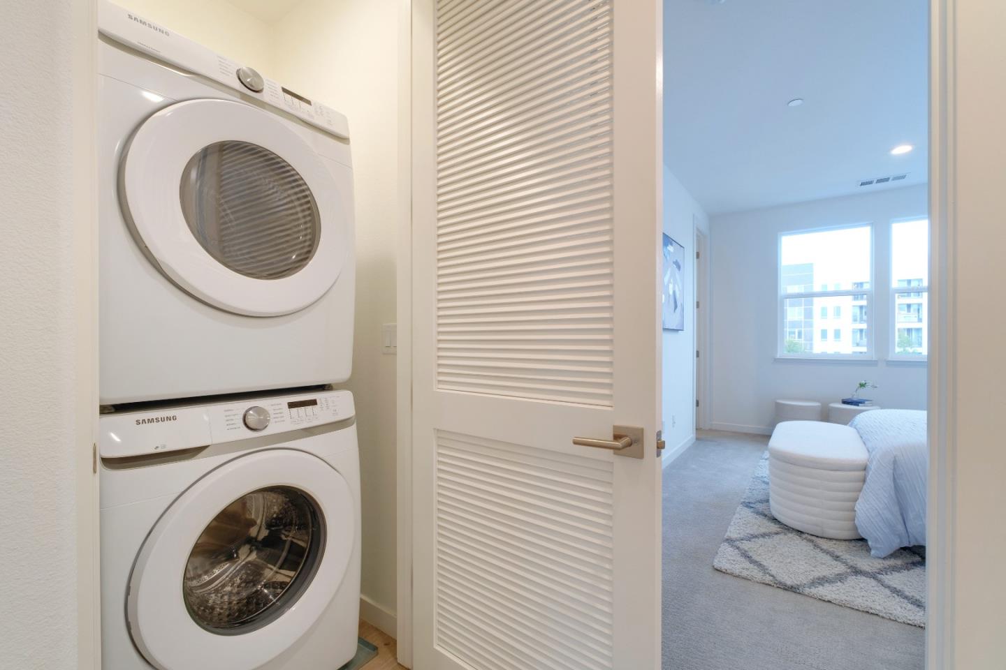 1888 Joshua Tree Circle Milpitas, CA 95035 - Photo 37 of 50 a view of a hallway with washer and dryer