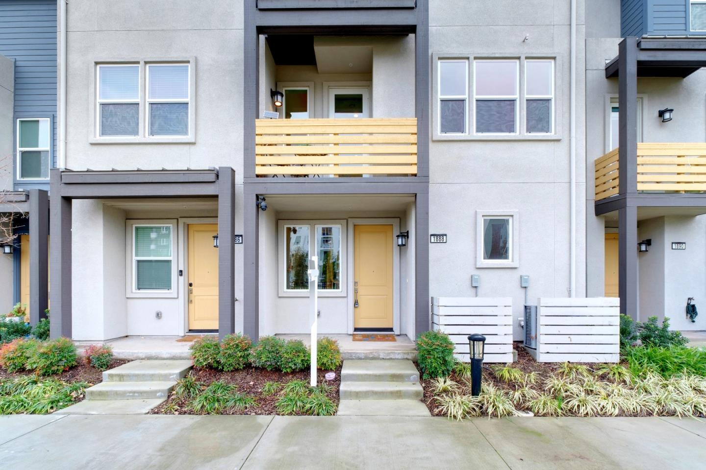 1888 Joshua Tree Circle Milpitas, CA 95035 - Photo 39 of 50 a view of a house with small yard and plants