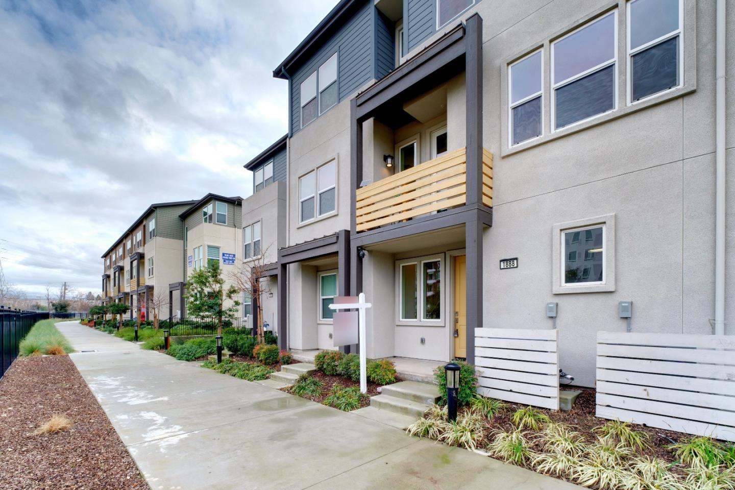 1888 Joshua Tree Circle Milpitas, CA 95035 - Photo 48 of 50 a front view of a house with a yard