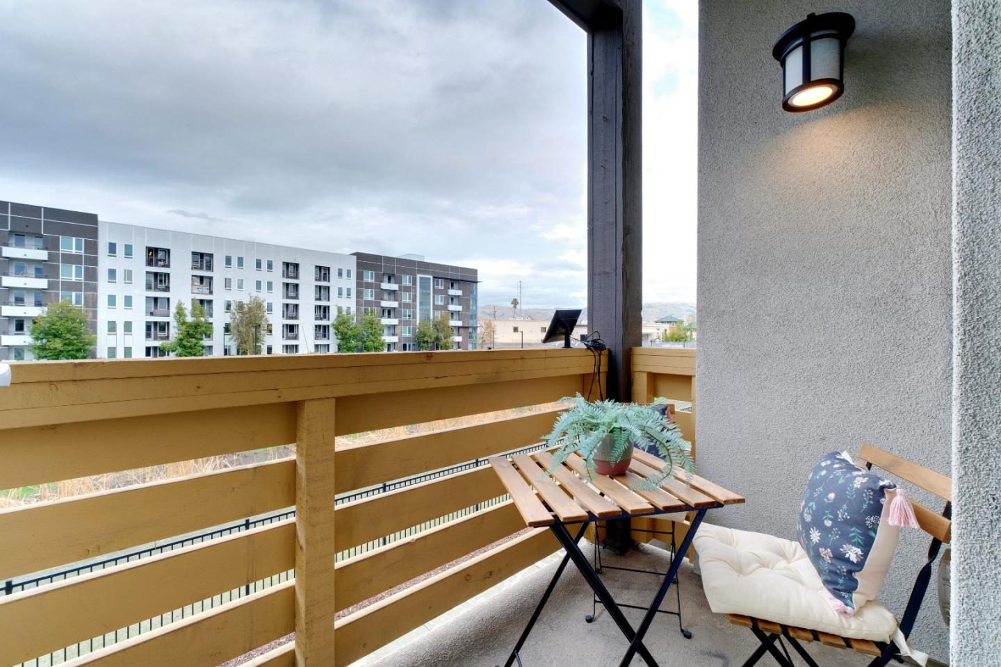 1888 Joshua Tree Circle Milpitas, CA 95035 - Photo 9 of 50 a balcony with table and chairs