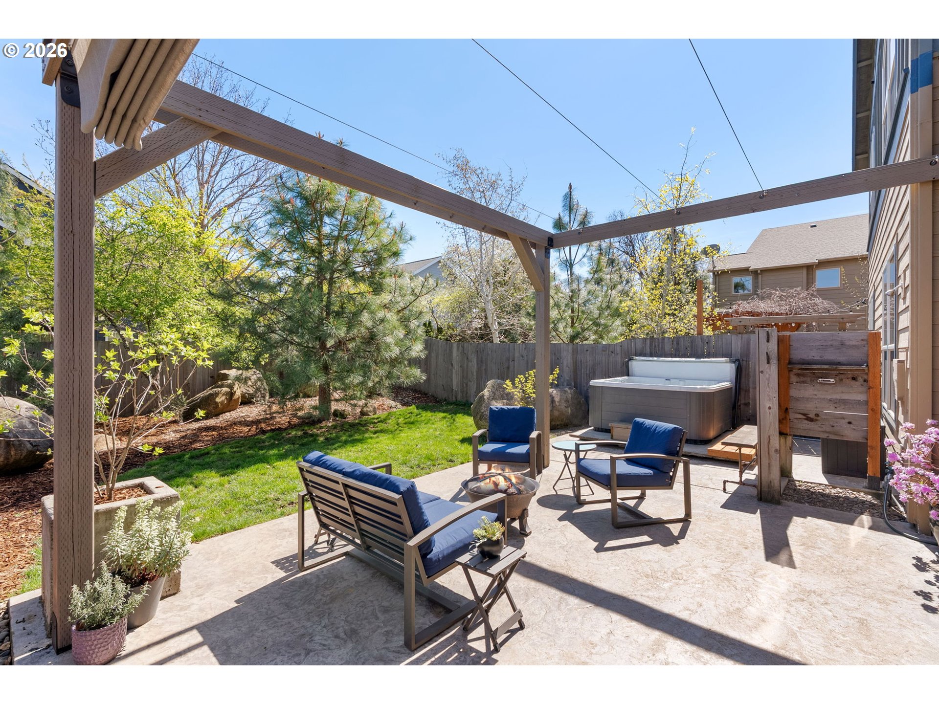 921 Goose Way Hood River, OR 97031 - Photo 12 of 44 a swimming pool with outdoor seating and yard