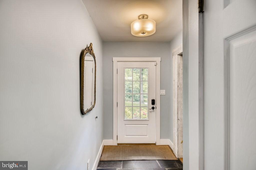13605 Bardon Road Phoenix, MD 21131 - Photo 13 of 37 3/4 glass door brings abundant light to foyer