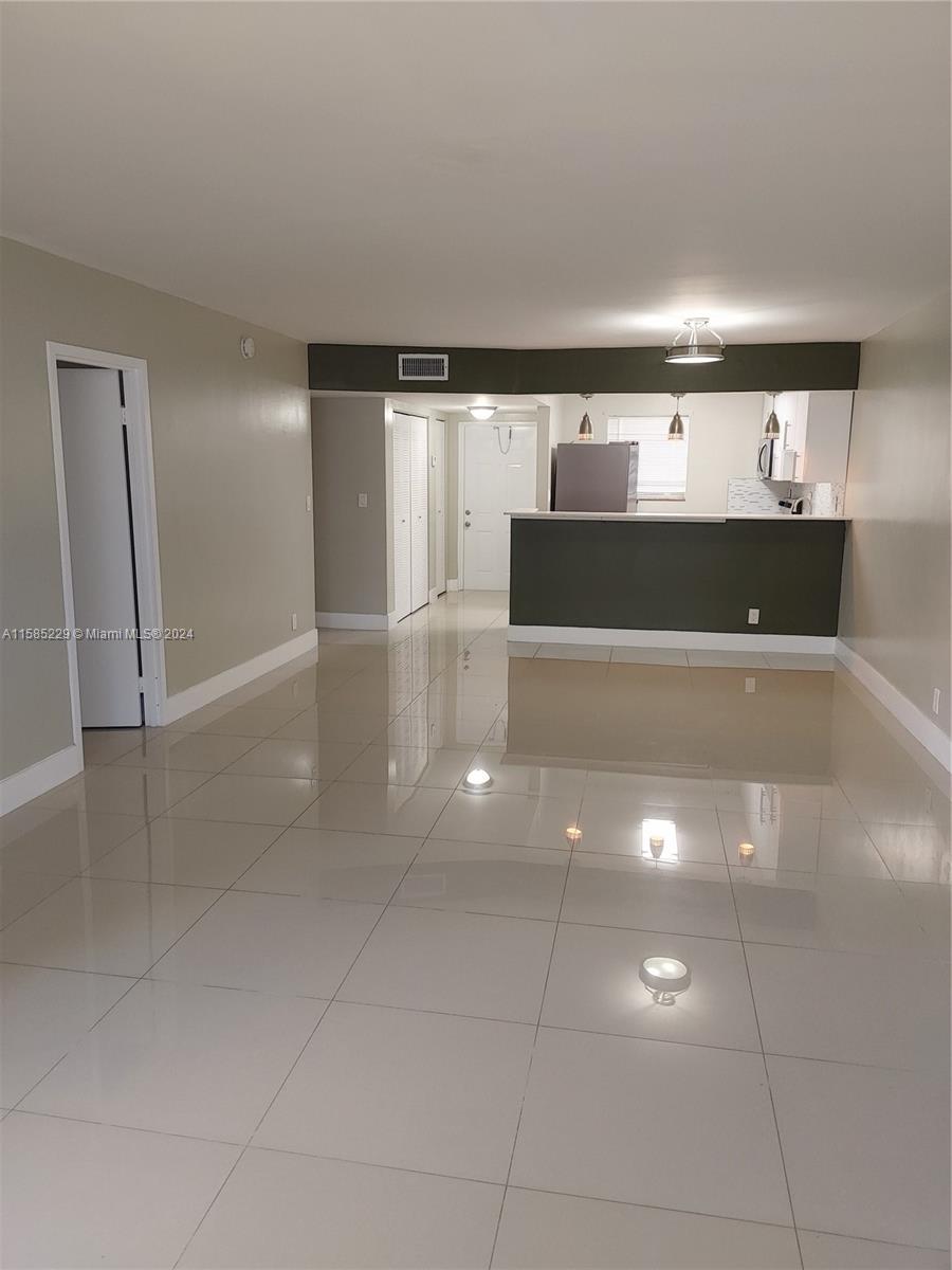 8330 Sands Point Boulevard, Unit N107 Tamarac, FL 33321 - Photo 2 of 13 a view of empty room