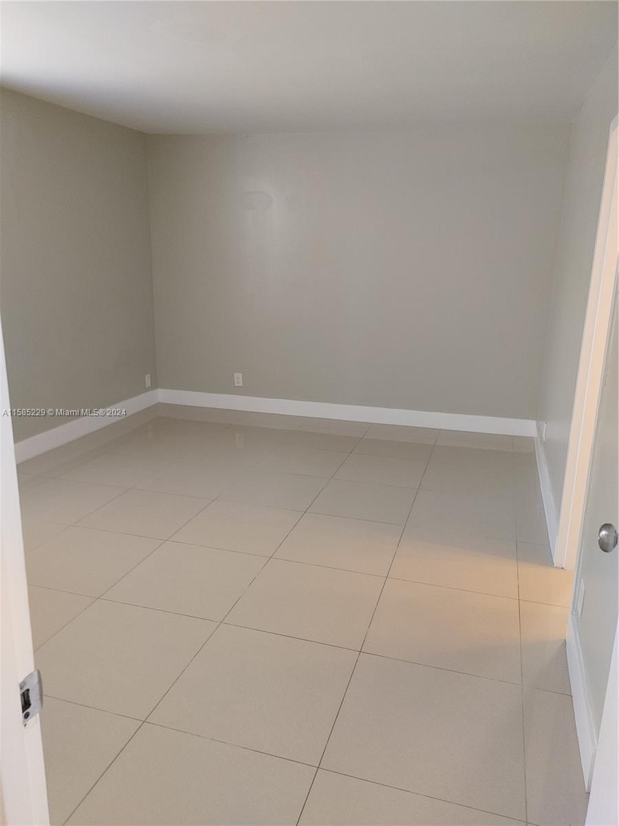 8330 Sands Point Boulevard, Unit N107 Tamarac, FL 33321 - Photo 6 of 13 a view of an empty room