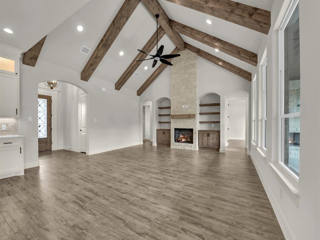 313 Wrangler Court Weatherford, TX 76088 - Photo 15 of 40 a view of a livingroom with furniture and wooden floor
